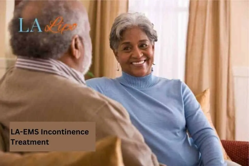 Couple sat smiling at each other - LA-EMS treatment Eastcote