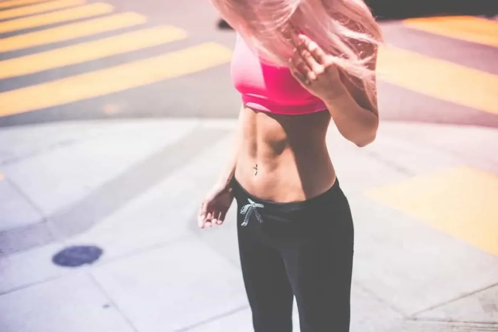 Woman with toned stomach after LA-EMS Body Sculpting Treatment Eastcote